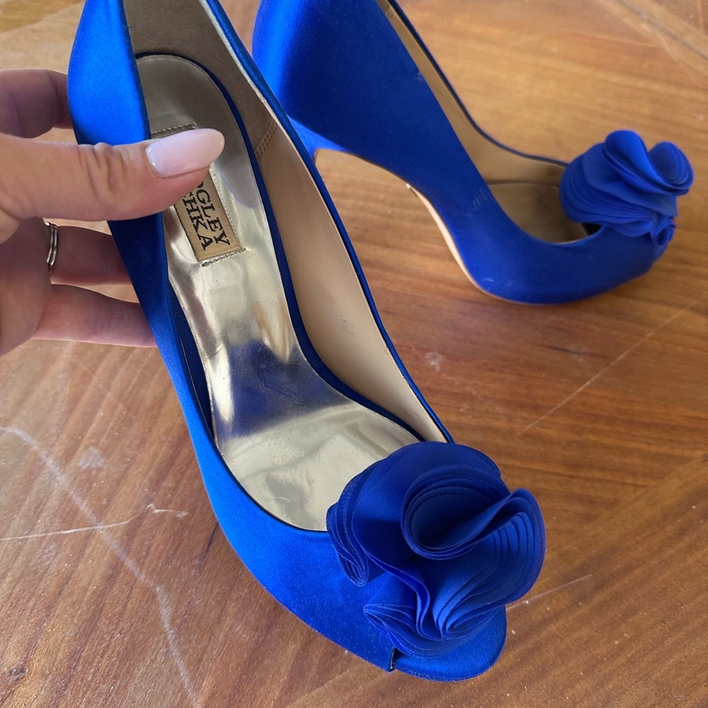 Blue satin pumps